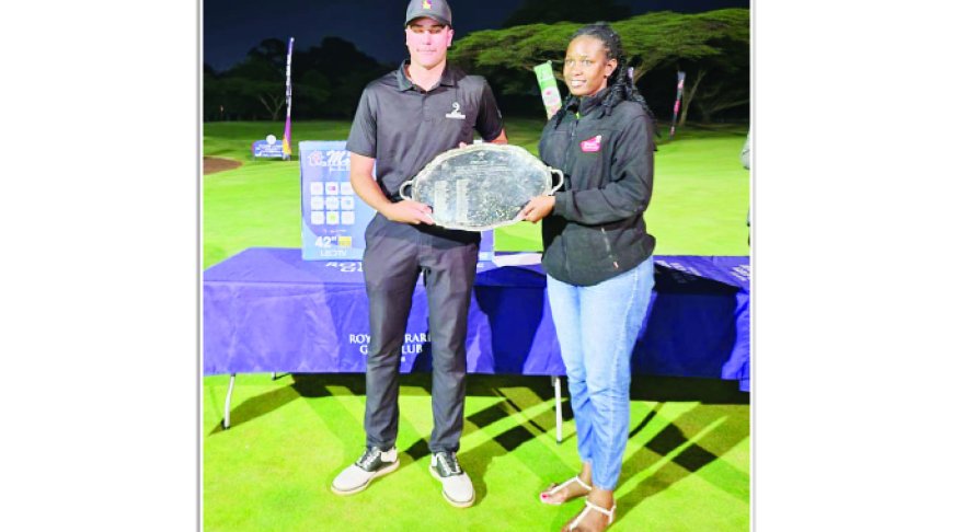 COACH BACKS ZIM GOLFERS